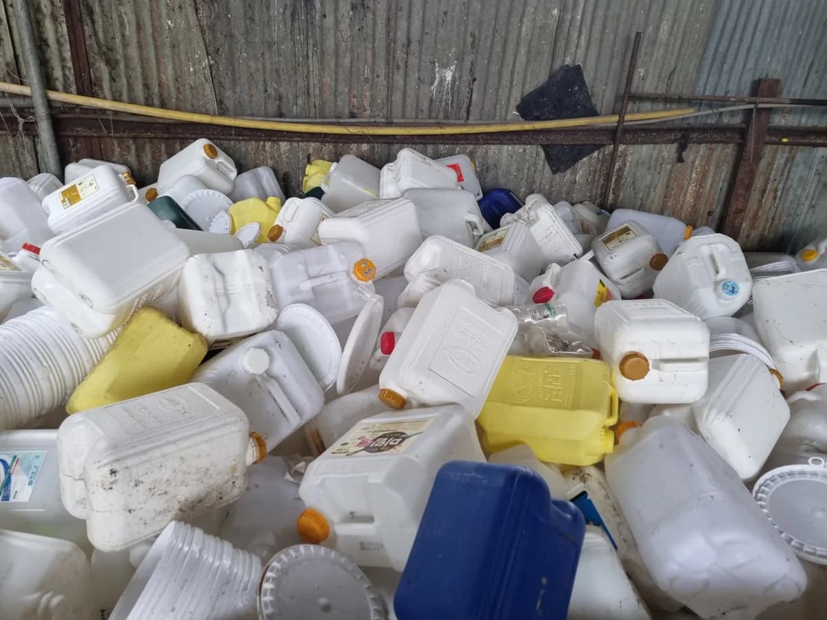 Collected plastic containers awaiting recycling